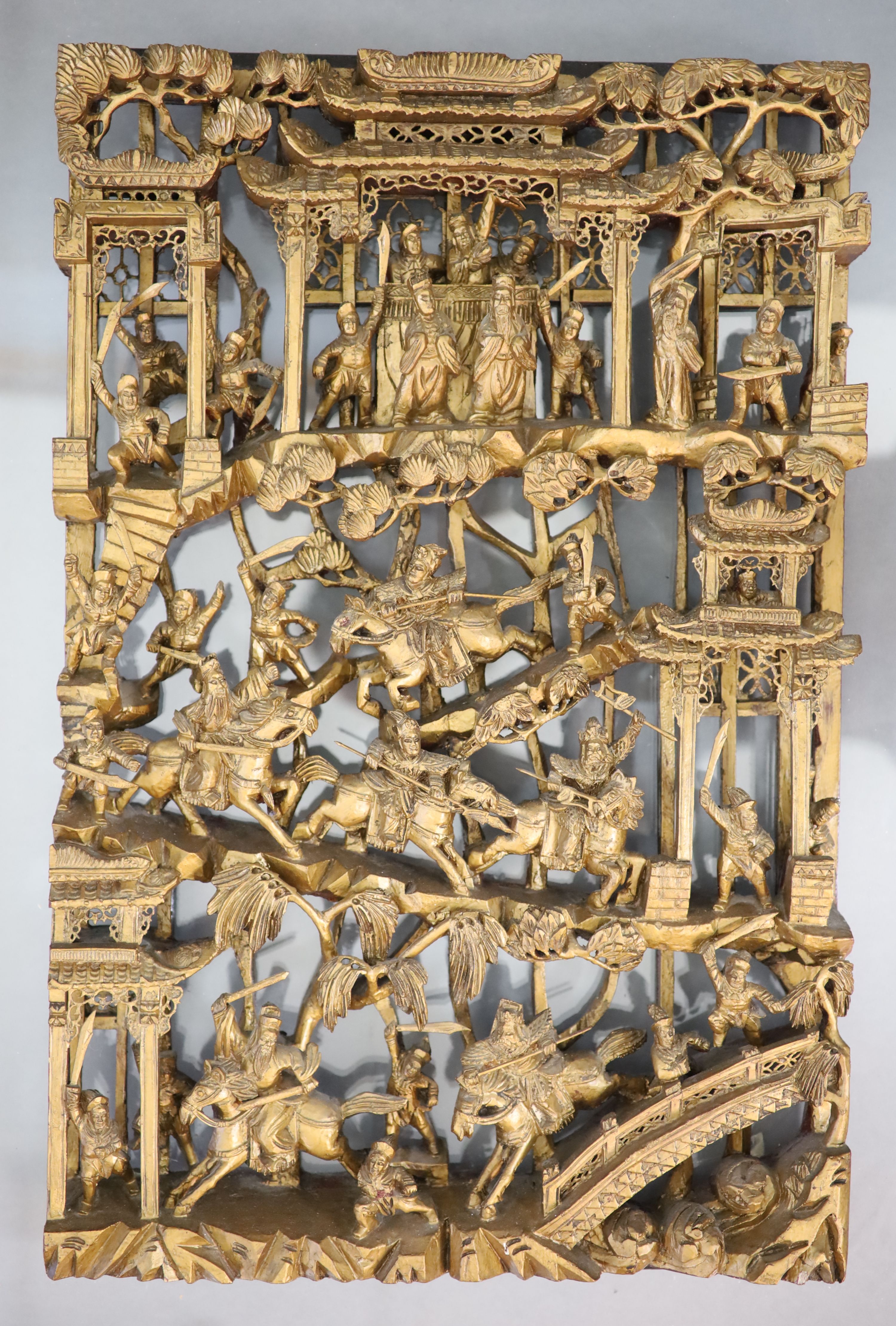 A pair of Chinese giltwood panels, late 19th century 63.5 x 40.5cm excluding Perspex mount